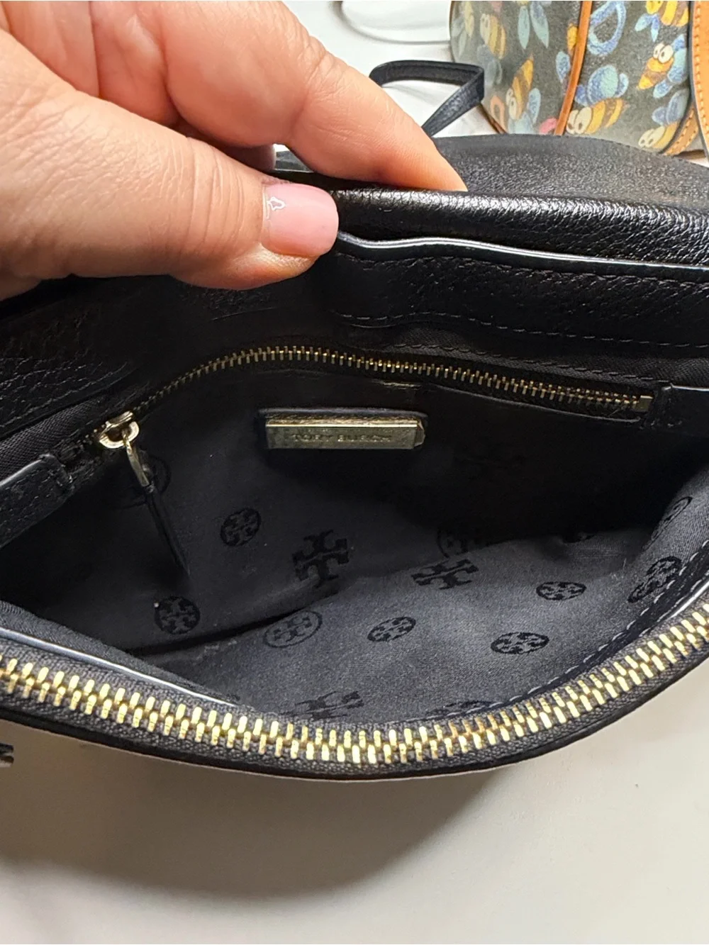 Tory Burch Black Leather Crossbody Bag with Embossed Medallion